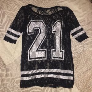 Black and white jersey like laced shirt